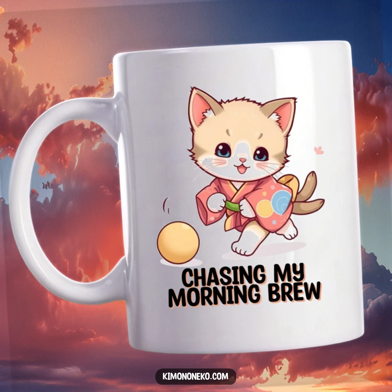 Funny playful kitten mug, showing a kitten in a vibrant kimono energetically chasing a ball, capturing pure joy and feline mischief.