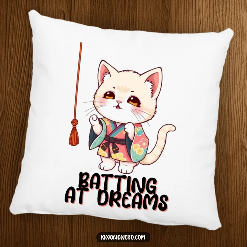 Funny Kitten Kimono Pillow: A mischievous kitten in a colorful kimono playfully batting at a dangling string, soft and humorous.