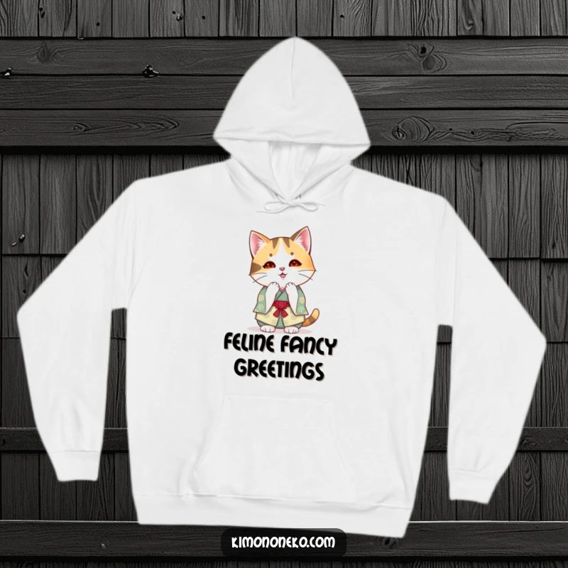 Funny kawaii calico cat in a festive kimono bowing on a cozy hoodie, offering warmth and humorous anime politeness.