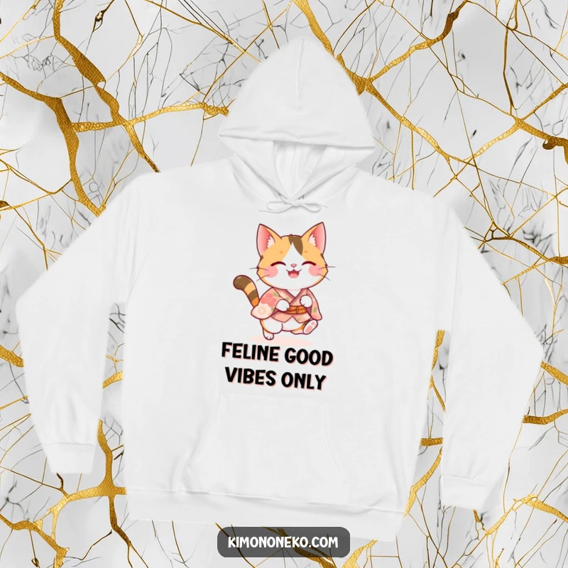 Funny calico kawaii cat in a floral kimono performing a joyful pounce, showcasing its adorable and energetic personality on a comfortable hoodie.