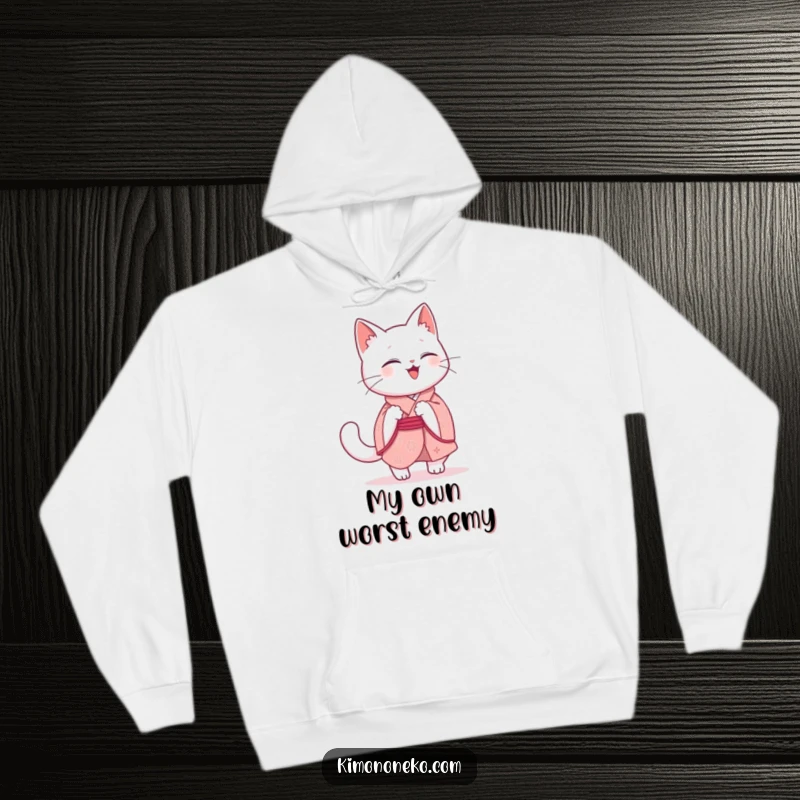 Funny Kawaii Cat Hoodie: A giggling white cat in a pink kimono spins around, happily chasing its tail in a humorous, cozy design.