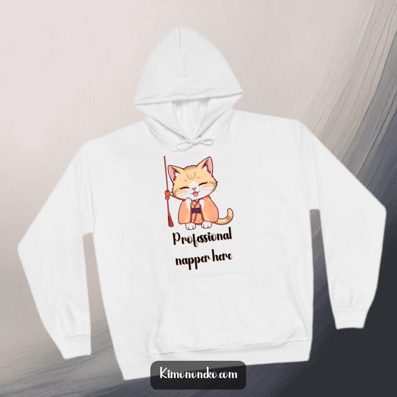 Funny hoodie showcasing a naughty cat in a patterned kimono, batting playfully at a dangling silk cord, embodying a spirit of delightful mayhem.