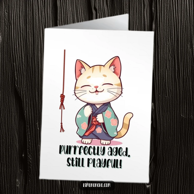 Funny Free Printable Birthday Card: Kawaii cat in kimono playfully bats at string, a comical and cute DIY gift.
