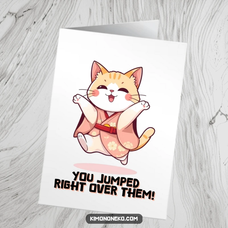 Funny Free Printable Congratulations Card: Playful cat in a festive kimono attempts a jump, celebrating a win.