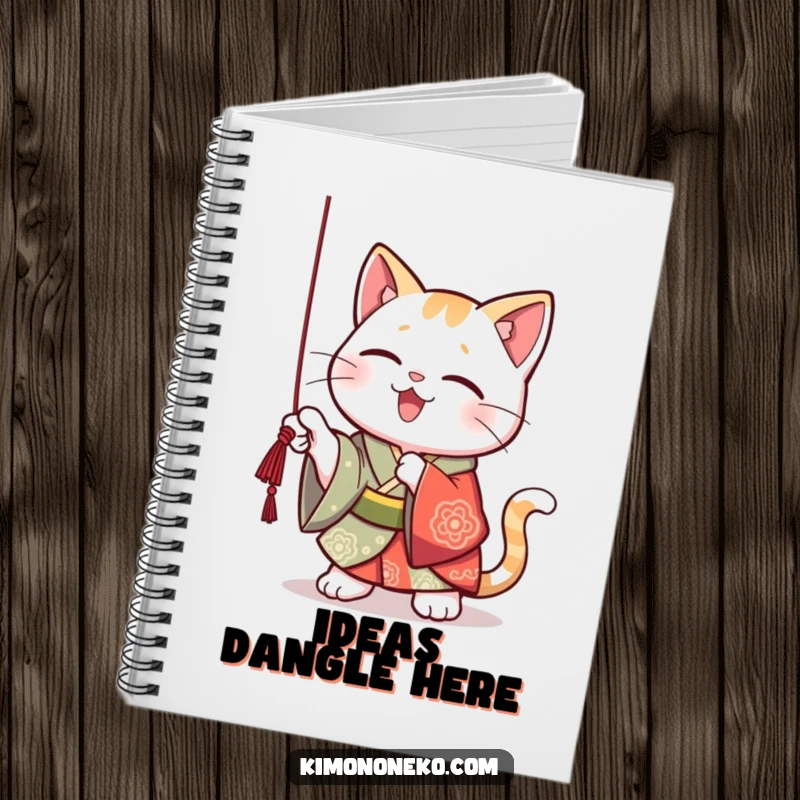 Funny Kawaii cat in a vibrant kimono, playfully batting at a dangling string, perfect for notes and creative ideas.