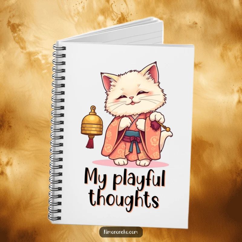 Funny notebook cover featuring a fluffy kawaii cat in a kimono, playfully batting at a bell, perfect for jotting down notes whimsically.