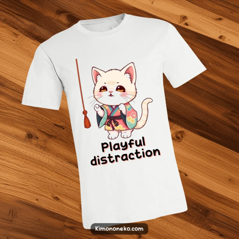 Funny Kitten Kimono T-Shirt: A mischievous kitten in a colorful kimono playfully batting at a dangling string, pure feline joy.