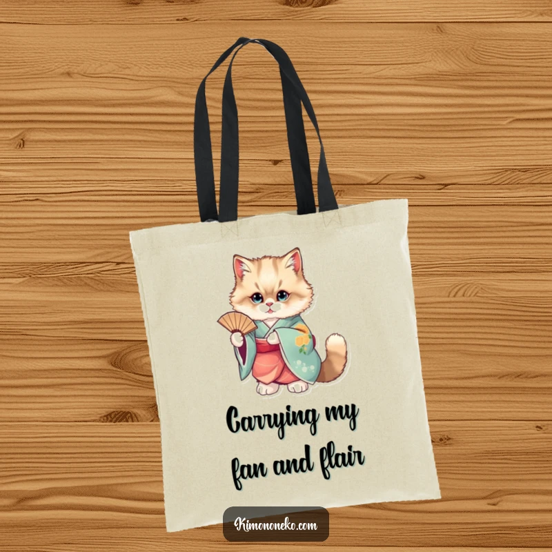 Funny tote bag featuring a fluffy cat in a vibrant kimono posing gracefully with a fan.