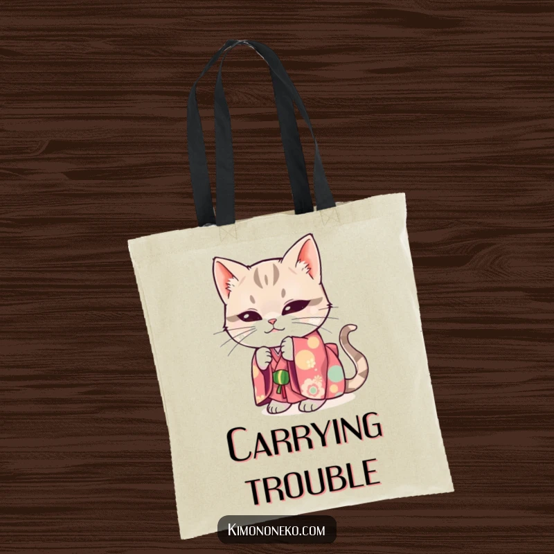 Funny tote bag showcasing a mischievous cat in a bright kimono, hiding with a playful glint.