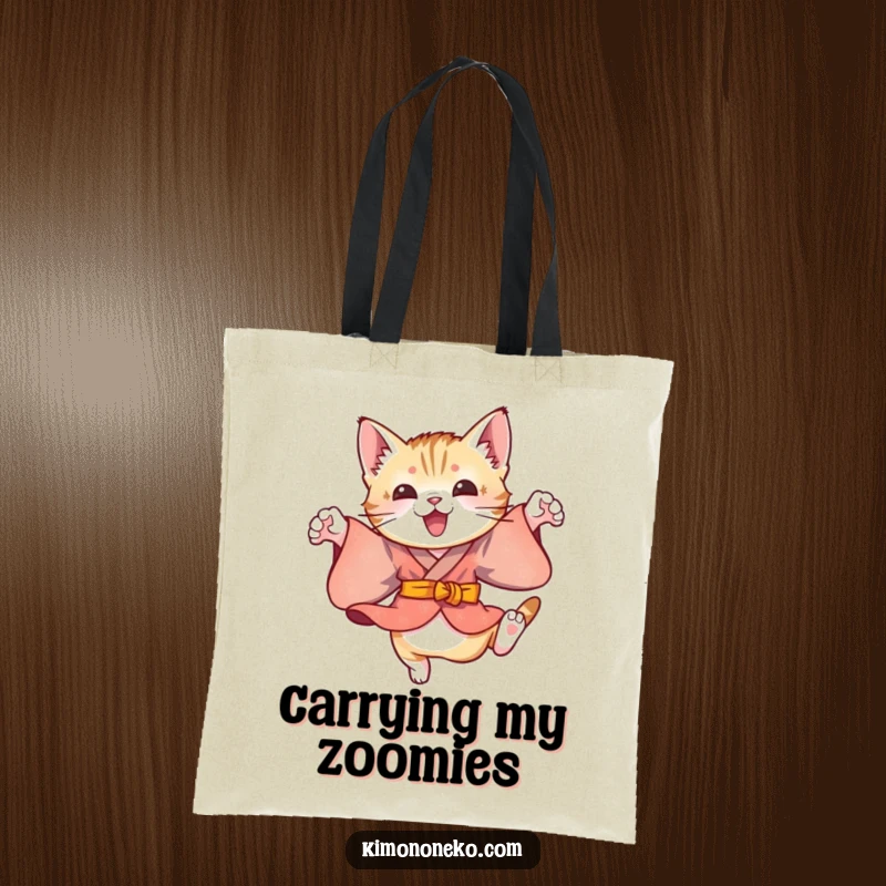 Funny canvas tote bag featuring a playful kitten in a colorful kimono, performing energetic leaps, perfect for carrying essentials with feline flair.